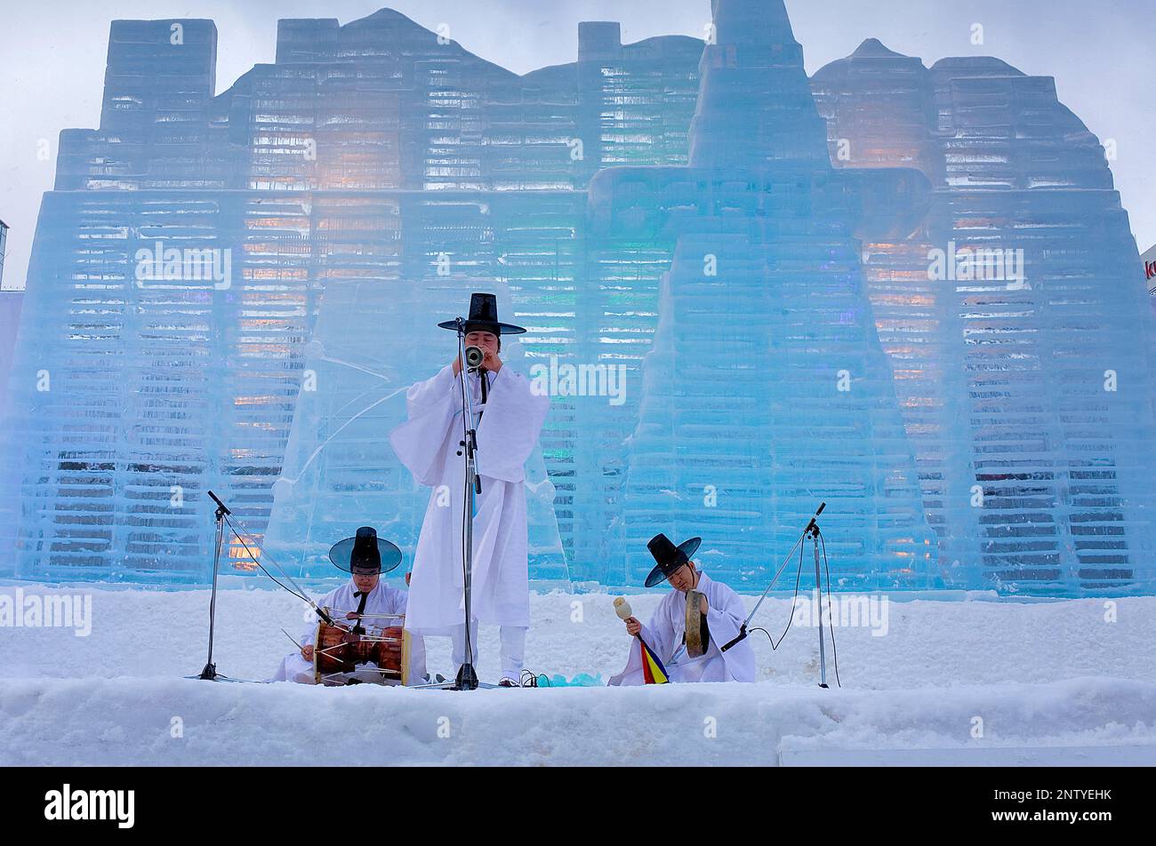 performance,Sapporo snow festival,in background ice sculpture,Odori Park, Sapporo, Hokkaido, Japan Stock Photo