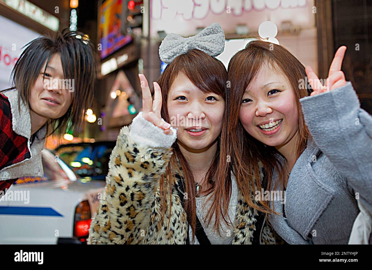 Friends in Sapporo Ekimae dori, Susukino entertainment district ,Sapporo, Hokkaido, Japan Stock Photo