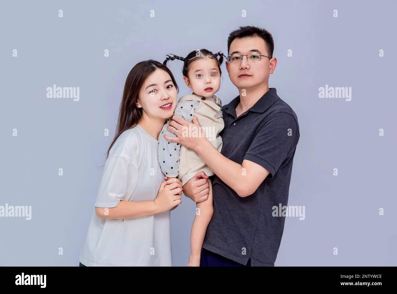 Beijing, China. 28th Feb, 2023. This undated photo shows Tang Dafeng (L), her husband and her daughter Zhizhi, who was diagnosed with Rett syndrome. TO GO WITH 'Feature: Chinese moms share stories of daughters battling rare Rett syndrome' Credit: Xinhua/Alamy Live News Stock Photo