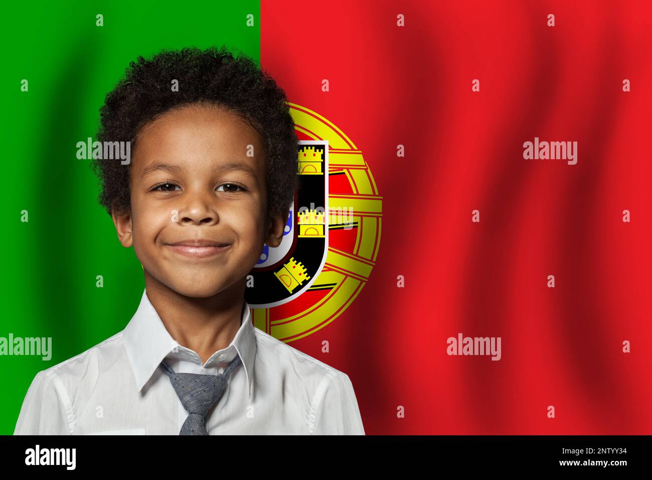 Portugese kid boy on flag of Portugal background. Education and