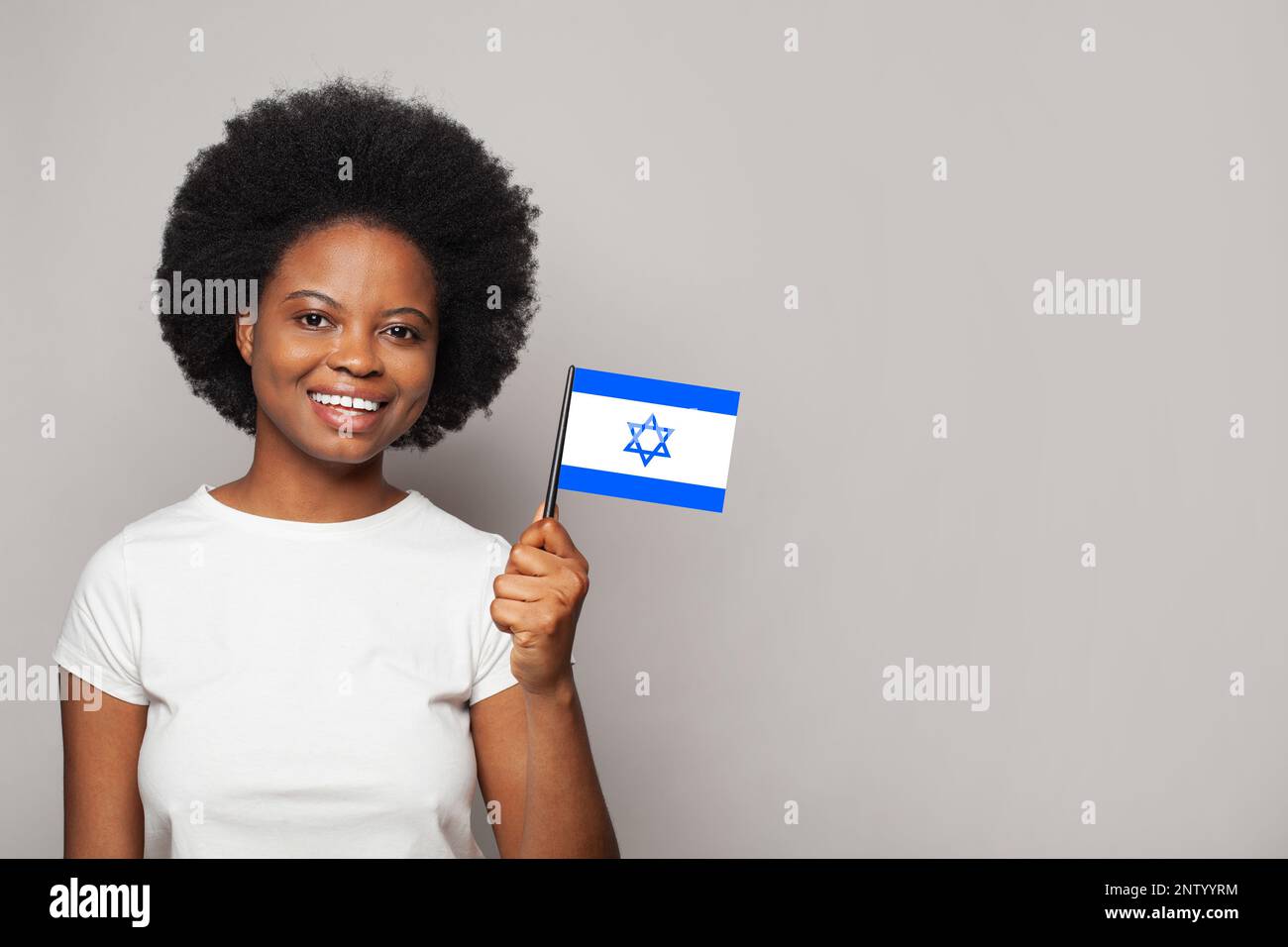 Izraeli woman holding flag of Izrael. Education, business, citizenship and patriotism concept Stock Photo