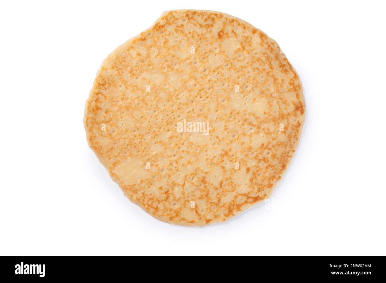 Studio shot of a handmade pancake cut out against a white background - John Gollop Stock Photo