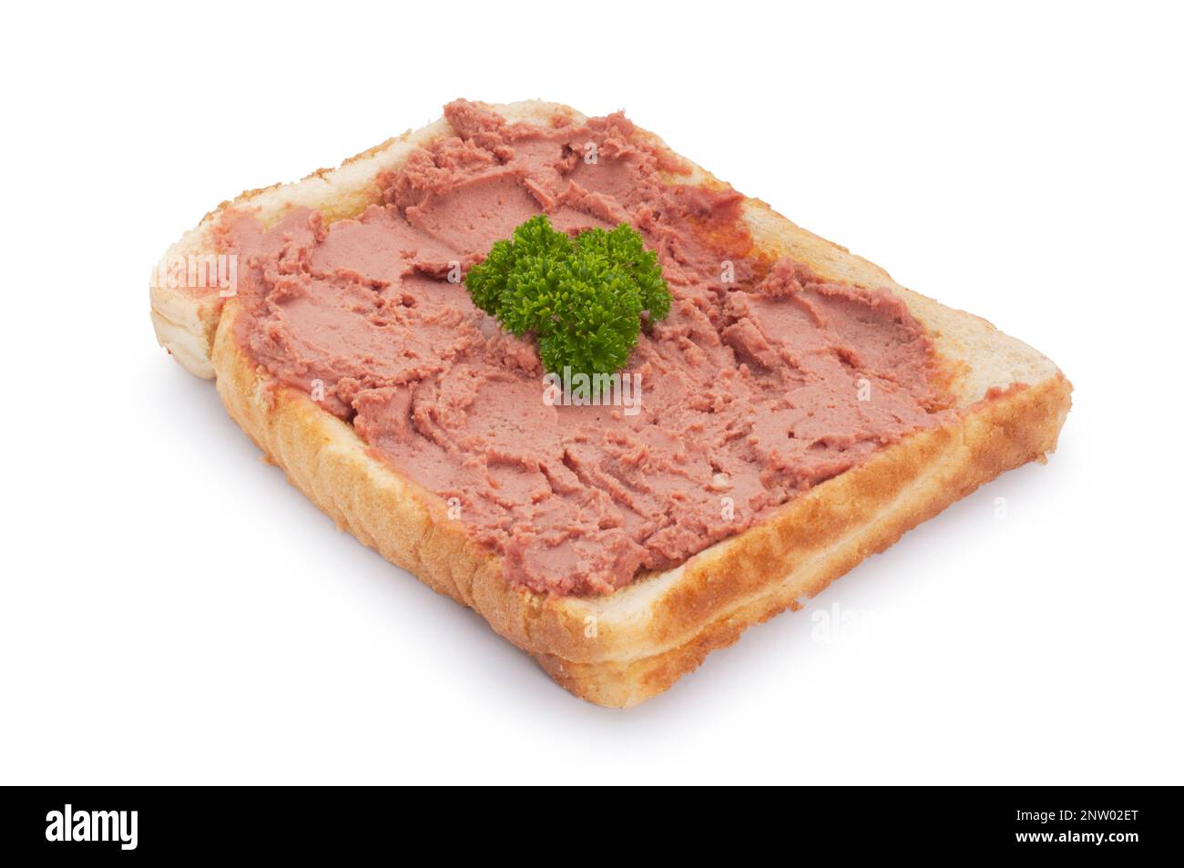 Studio shot of chicken liver pate spread on toast cut out against a