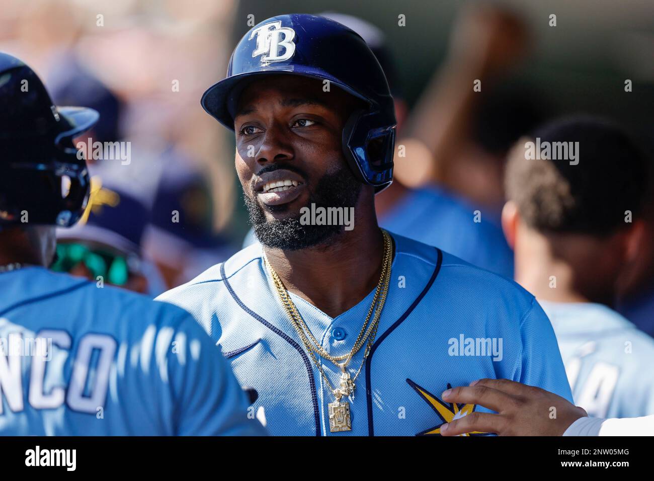Sarasota FL USA; Tampa Bay Rays left fielder Randy Arozarena (56) celebrates in the dugout after hitting a home run during an MLB spring training game against the Baltimore Orioles at Ed