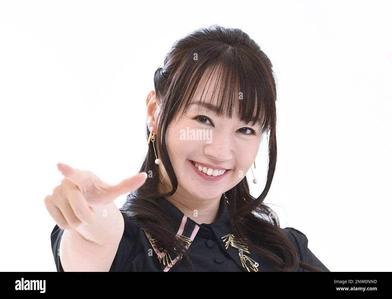 Japanese voice actress, singer and narrator Nana Mizuki pose for photo