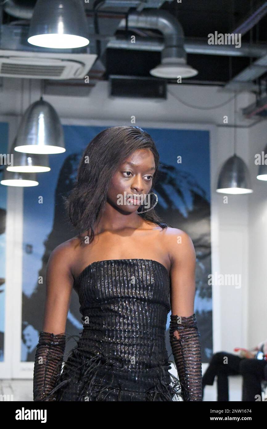 London, UK, 19th February 2023, LAN Fashion show was held in Croydon with London-based fashion designer Ettie. Ettie is a UK-based luxury handmade clothing brand founded by Juliette Stephenson. Ettie specialises in feminine party wear with pop colours and fun fabrics., Andrew Lalchan Photography/Alamy Live News Stock Photo