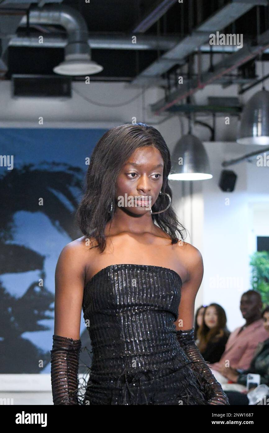 London, UK, 19th February 2023, LAN Fashion show was held in Croydon with London-based fashion designer Ettie. Ettie is a UK-based luxury handmade clothing brand founded by Juliette Stephenson. Ettie specialises in feminine party wear with pop colours and fun fabrics., Andrew Lalchan Photography/Alamy Live News Stock Photo