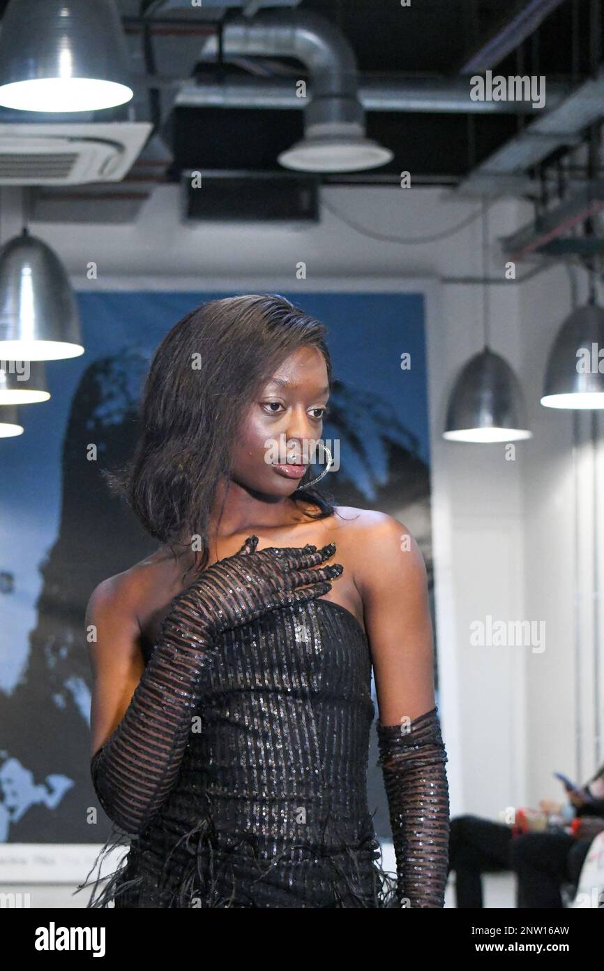 London, UK, 19th February 2023, LAN Fashion show was held in Croydon with London-based fashion designer Ettie. Ettie is a UK-based luxury handmade clothing brand founded by Juliette Stephenson. Ettie specialises in feminine party wear with pop colours and fun fabrics., Andrew Lalchan Photography/Alamy Live News Stock Photo