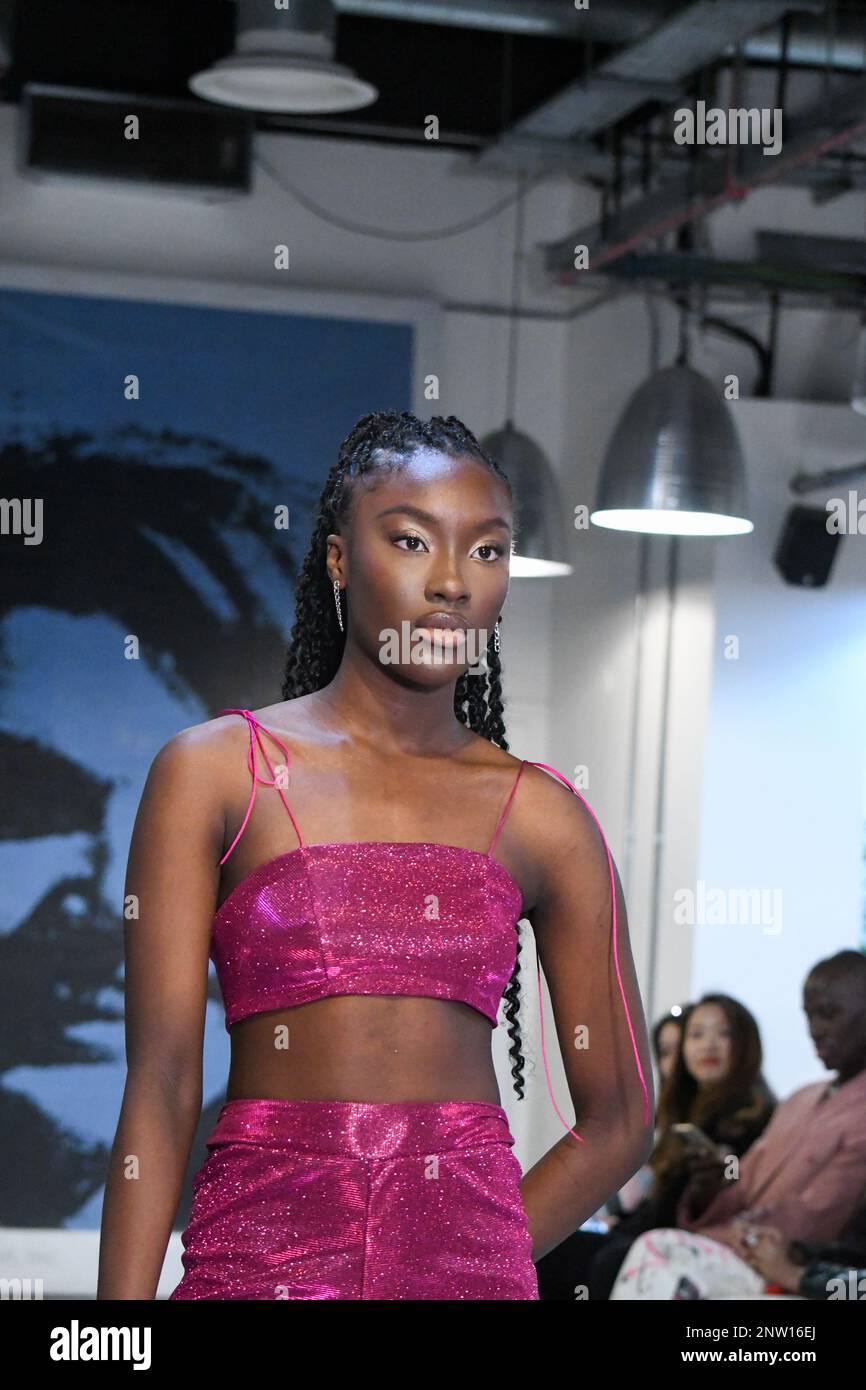 London, UK, 19th February 2023, LAN Fashion show was held in Croydon with London-based fashion designer Ettie. Ettie is a UK-based luxury handmade clothing brand founded by Juliette Stephenson. Ettie specialises in feminine party wear with pop colours and fun fabrics., Andrew Lalchan Photography/Alamy Live News Stock Photo