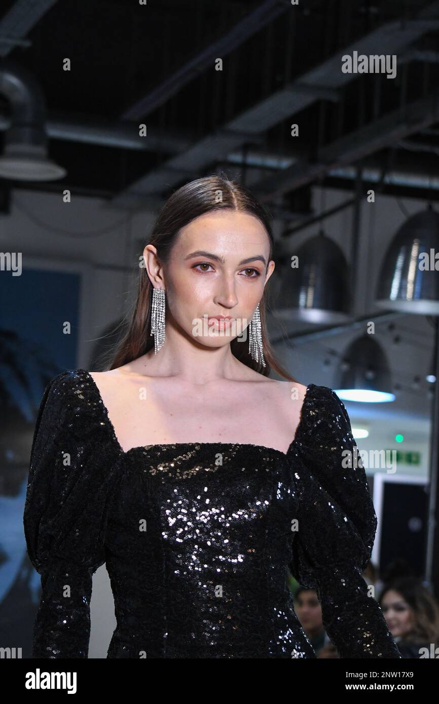 London, UK, 19th February 2023, LAN Fashion show was held in Croydon with London-based fashion designer Ettie. Ettie is a UK-based luxury handmade clothing brand founded by Juliette Stephenson. Ettie specialises in feminine party wear with pop colours and fun fabrics., Andrew Lalchan Photography/Alamy Live News Stock Photo