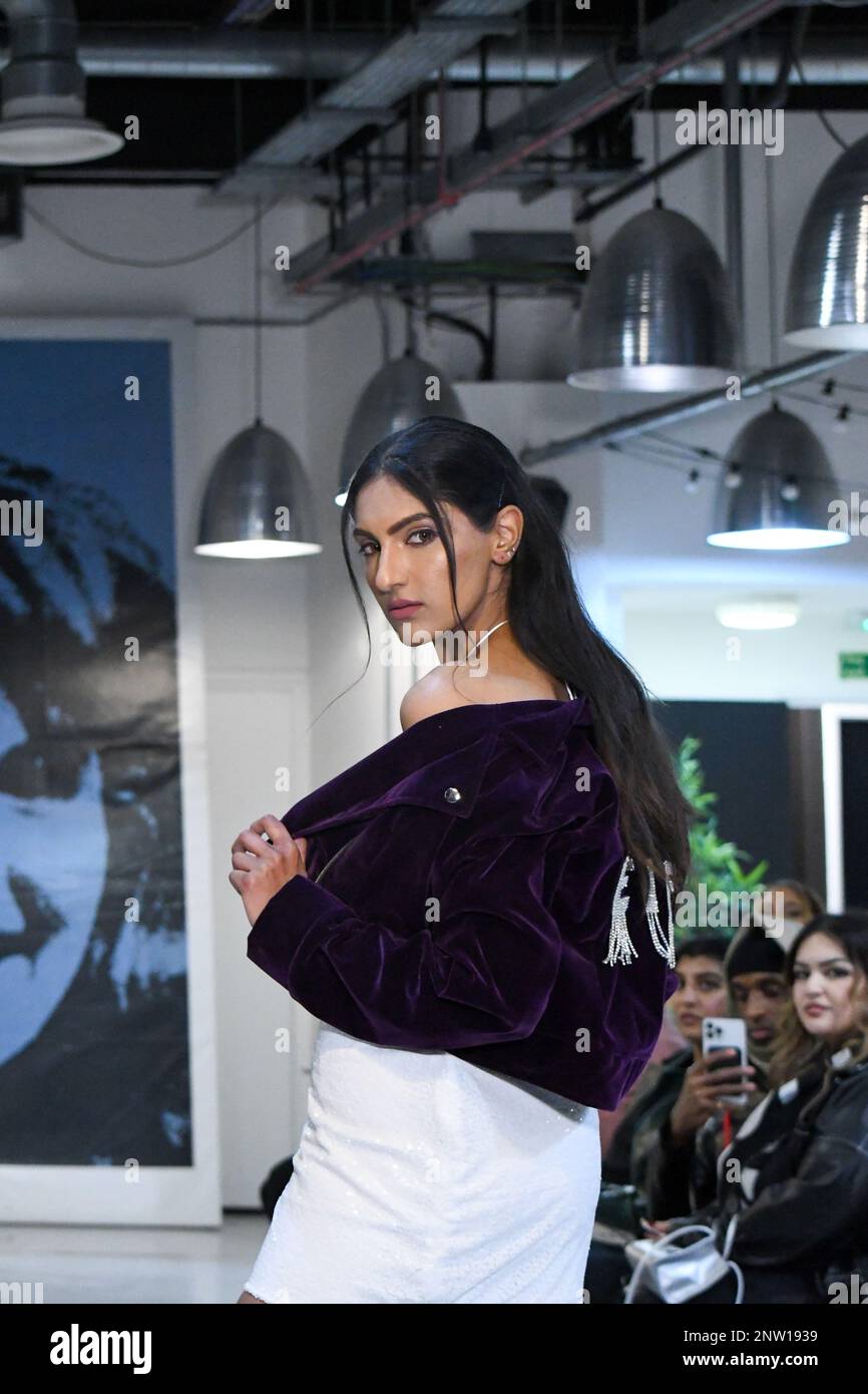 London, UK, 19th February 2023, LAN Fashion show was held in Croydon with London-based fashion designer Ettie. Ettie is a UK-based luxury handmade clothing brand founded by Juliette Stephenson. Ettie specialises in feminine party wear with pop colours and fun fabrics., Andrew Lalchan Photography/Alamy Live News Stock Photo