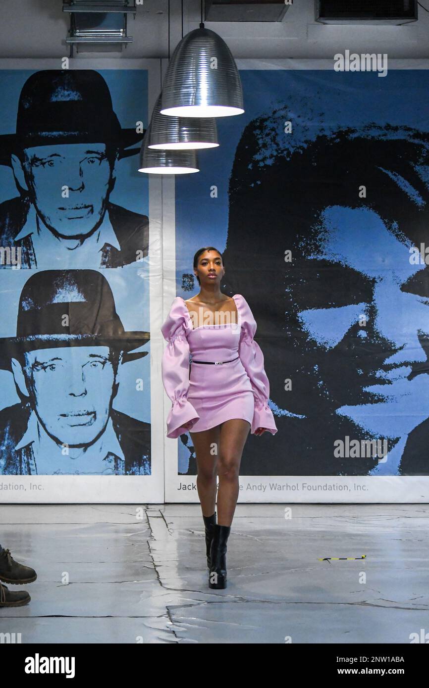 London, UK, 19th February 2023, LAN Fashion show was held in Croydon with London-based fashion designer Ettie. Ettie is a UK-based luxury handmade clothing brand founded by Juliette Stephenson. Ettie specialises in feminine party wear with pop colours and fun fabrics., Andrew Lalchan Photography/Alamy Live News Stock Photo