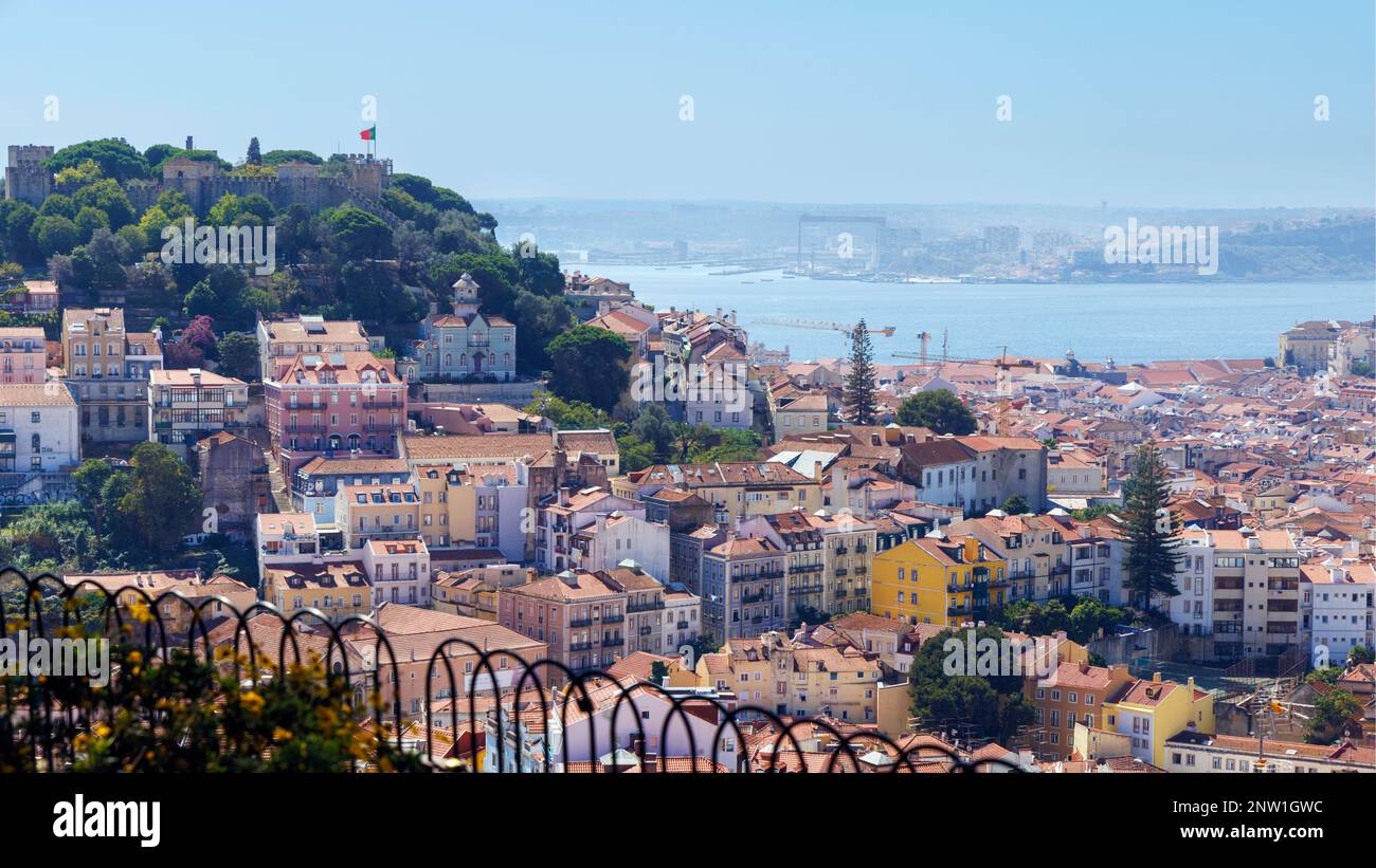 Lisbon, Portugal.   The city seen from Miradouro da Senhora do Monte/the Lady of the Hill Lookout.  St George's castle on left. Stock Photo