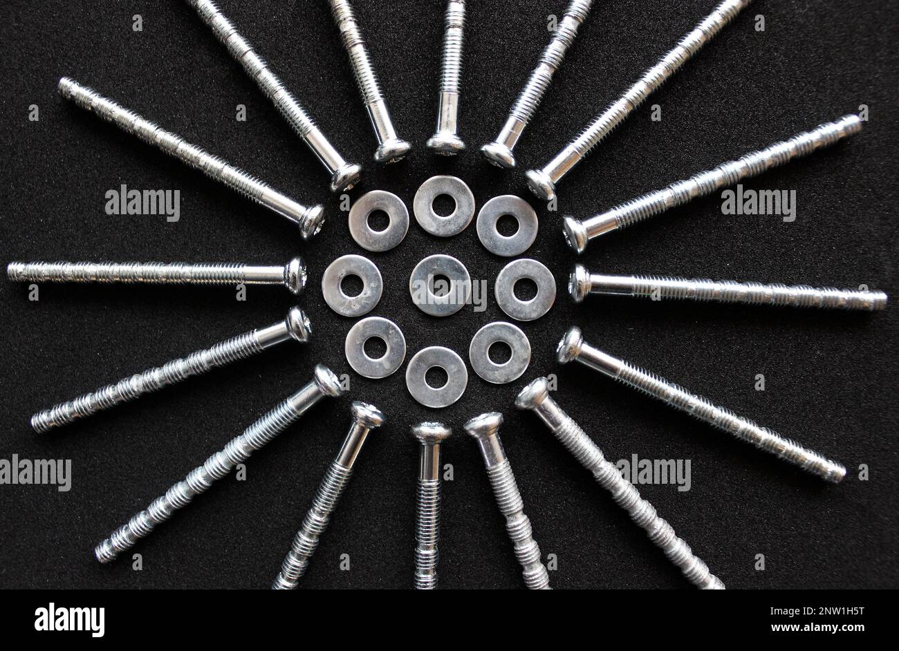 Cross Head Furniture Bolts Laid Out In Form Of Circle With Aluminum