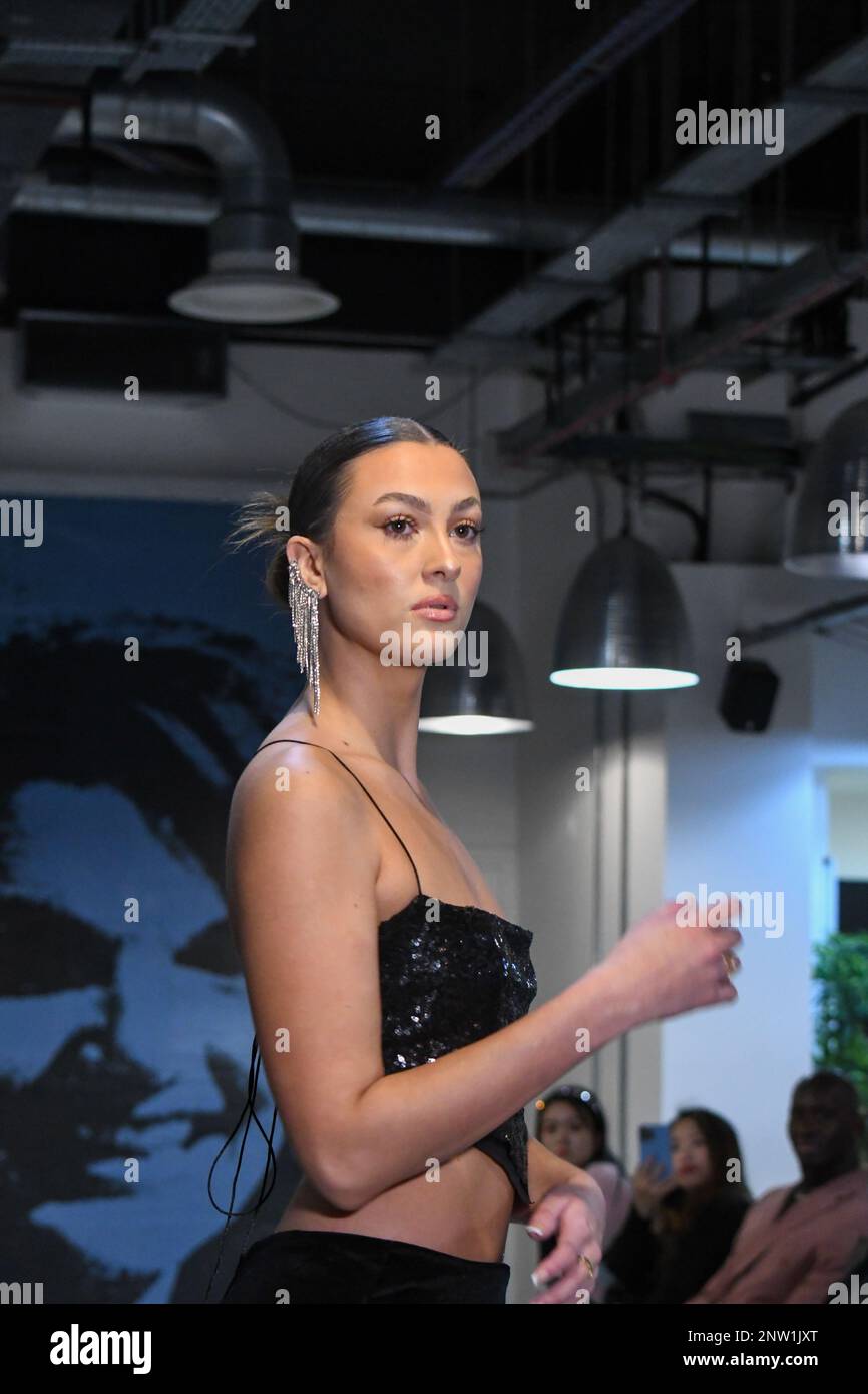 London, UK, 19th February 2023, LAN Fashion show was held in Croydon with London-based fashion designer Ettie. Ettie is a UK-based luxury handmade clothing brand founded by Juliette Stephenson. Ettie specialises in feminine party wear with pop colours and fun fabrics., Andrew Lalchan Photography/Alamy Live News Stock Photo