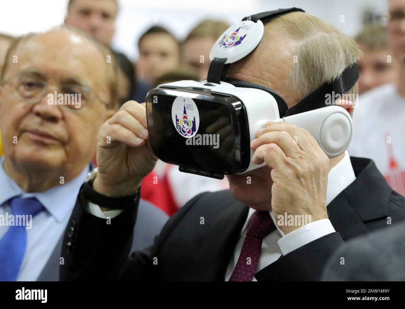 Russian President Vladimir Putin dons a VR headset during a visit to the  Moscow State University in Moscow, Russia, Wednesday, Jan. 23, 2019.  (Mikhail Klimentyev, Sputnik, Kremlin Pool Photo via AP Stock