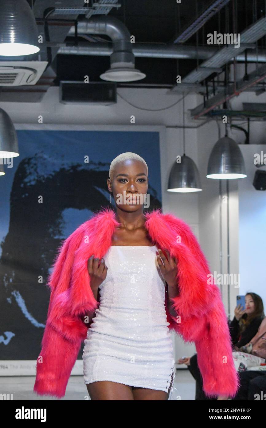 London, UK, 19th February 2023, LAN Fashion show was held in Croydon with London-based fashion designer Ettie. Ettie is a UK-based luxury handmade clothing brand founded by Juliette Stephenson. Ettie specialises in feminine party wear with pop colours and fun fabrics., Andrew Lalchan Photography/Alamy Live News Stock Photo