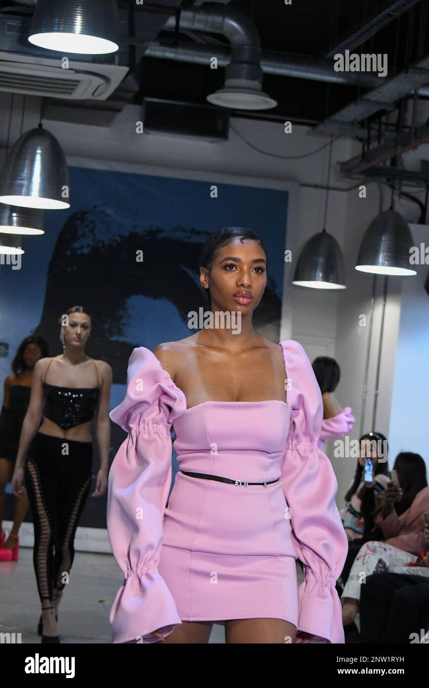 London, UK, 19th February 2023, LAN Fashion show was held in Croydon with London-based fashion designer Ettie. Ettie is a UK-based luxury handmade clothing brand founded by Juliette Stephenson. Ettie specialises in feminine party wear with pop colours and fun fabrics., Andrew Lalchan Photography/Alamy Live News Stock Photo