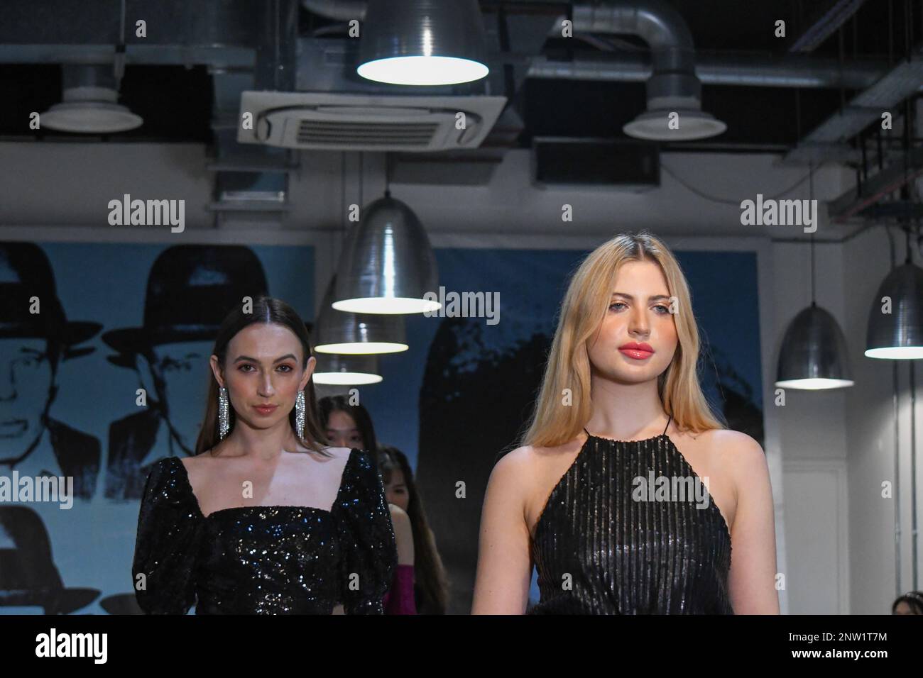 London, UK, 19th February 2023, LAN Fashion show was held in Croydon with London-based fashion designer Ettie. Ettie is a UK-based luxury handmade clothing brand founded by Juliette Stephenson. Ettie specialises in feminine party wear with pop colours and fun fabrics., Andrew Lalchan Photography/Alamy Live News Stock Photo