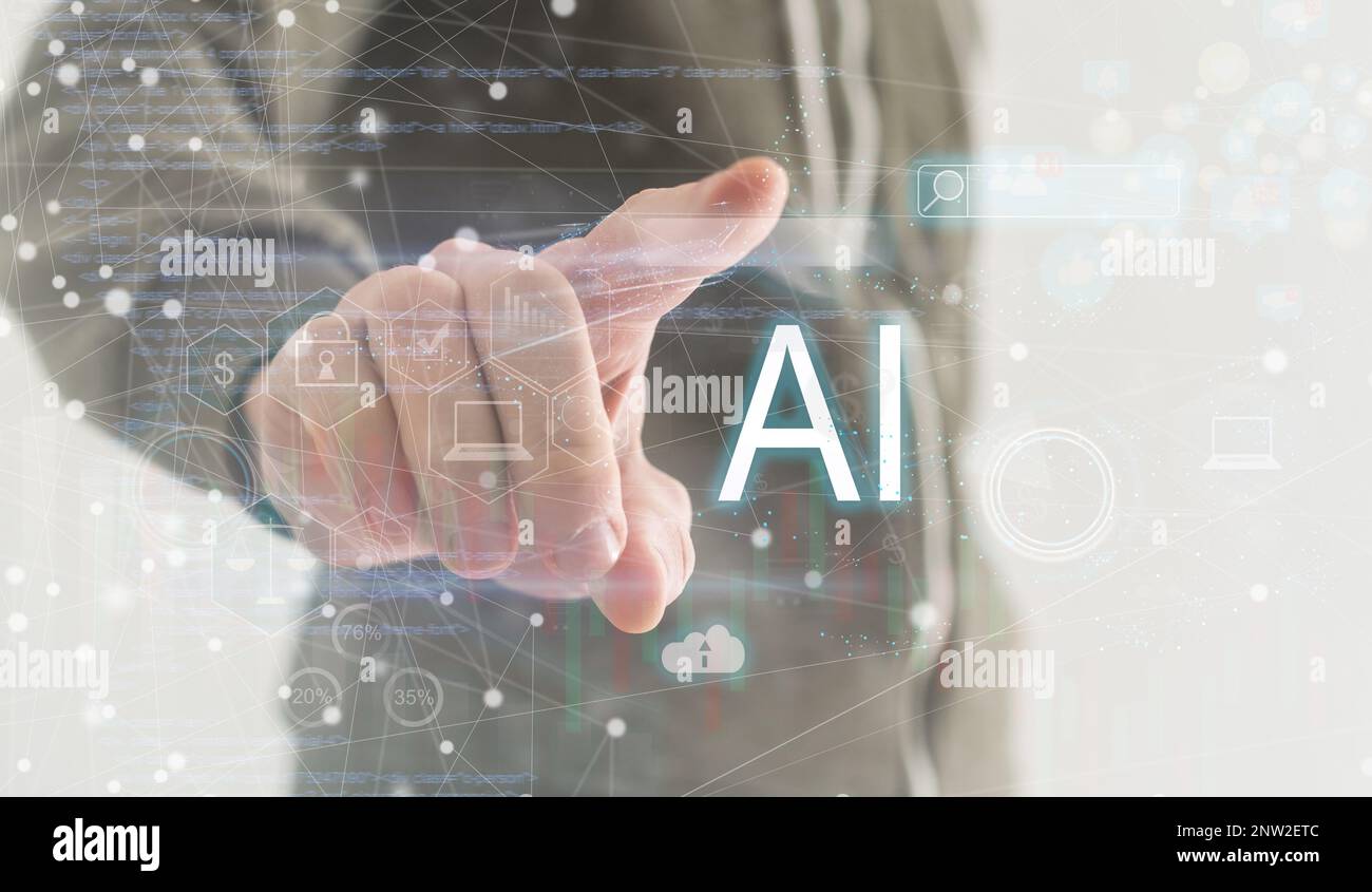 Chat with AI or Artificial Intelligence technology. Businessman using a laptop computer chatting with an intelligent artificial intelligence asks for Stock Photo