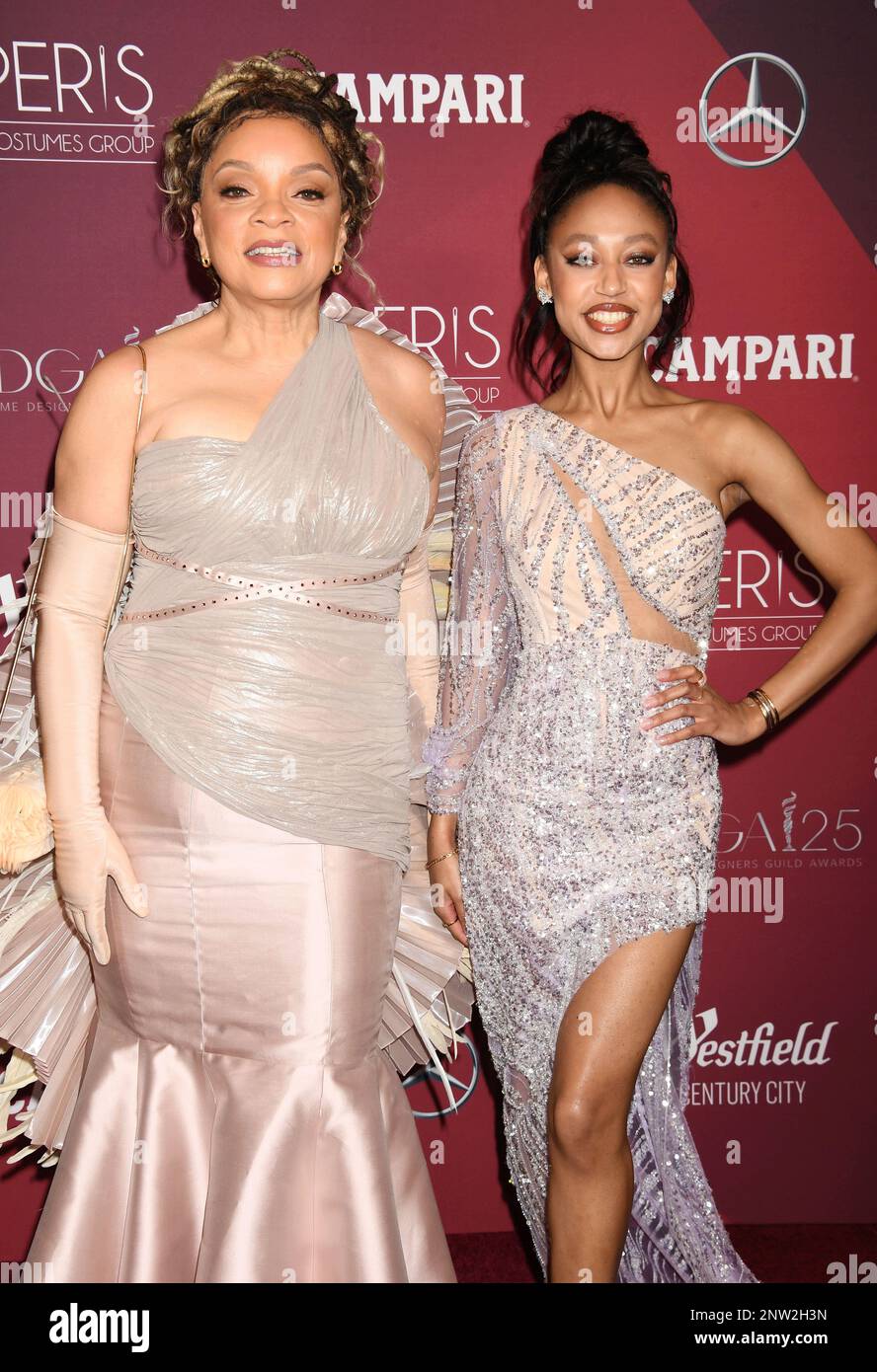 LOS ANGELES, CALIFORNIA - FEBRUARY 27: (L-R) Ruth E. Carter and D'on Lauren Edwards attend the 25th Annual Costume Designers Guild Awards at the Fairm Stock Photo