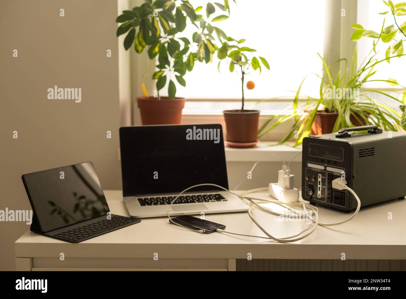 portable charging station charges gadgets Stock Photo