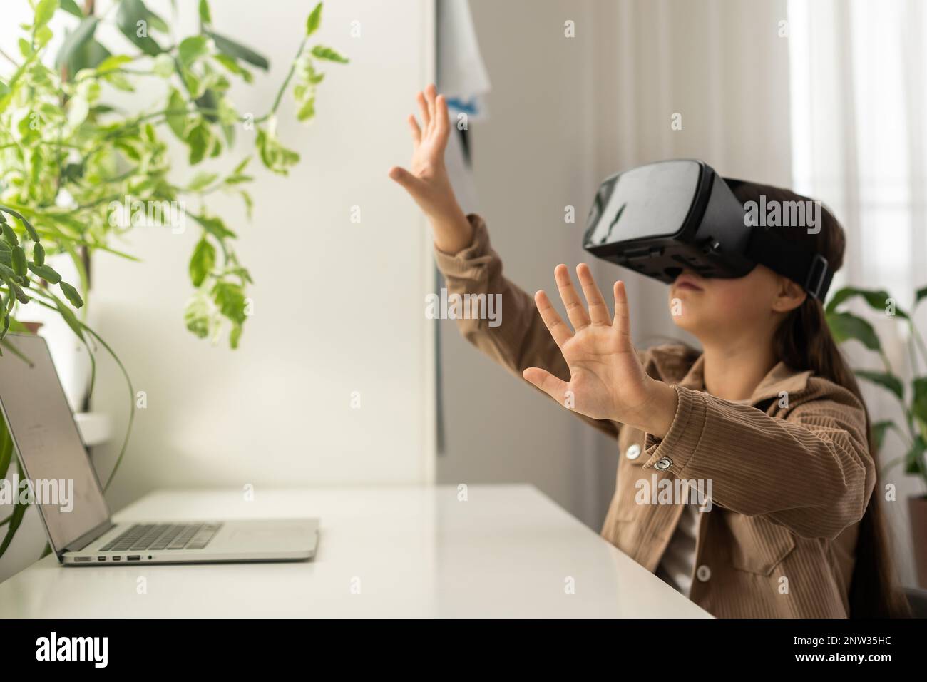 teenage schoolgirls using virtual reality headsets Stock Photo - Alamy