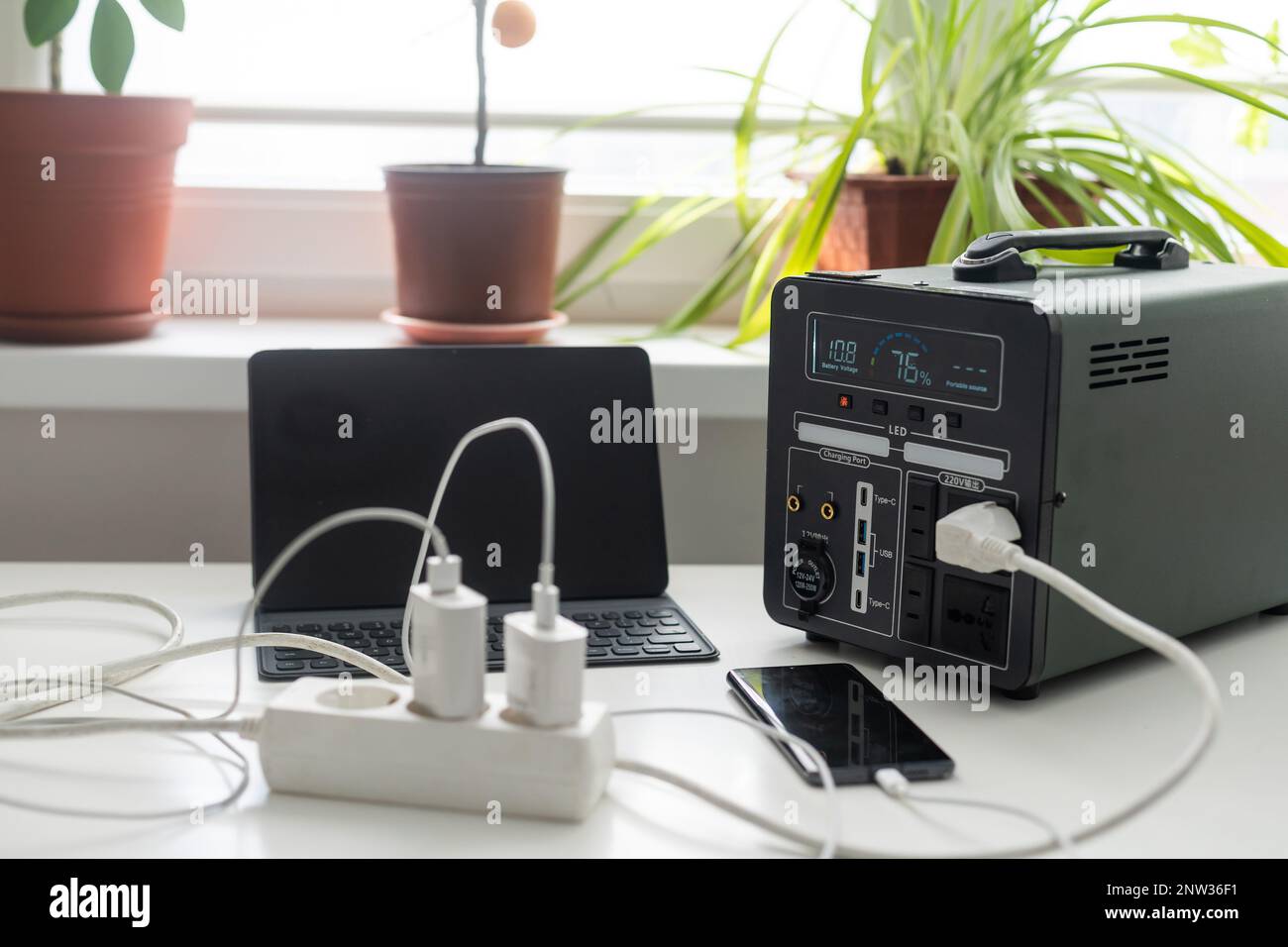 portable charging station charges gadgets Stock Photo