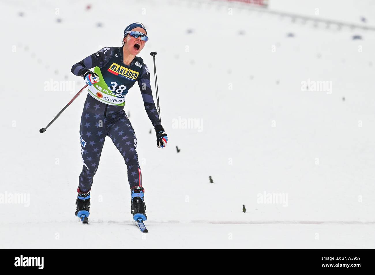 Planica, Slovenia. 28th Feb, 2023. American Jessie Diggins crosses the finish line to win the women’s 10-K freestyle race at the 2023 FIS World Nordic Ski Championships in Planica, Slovenia. John Lazenby/Alamy Live news Stock Photo
