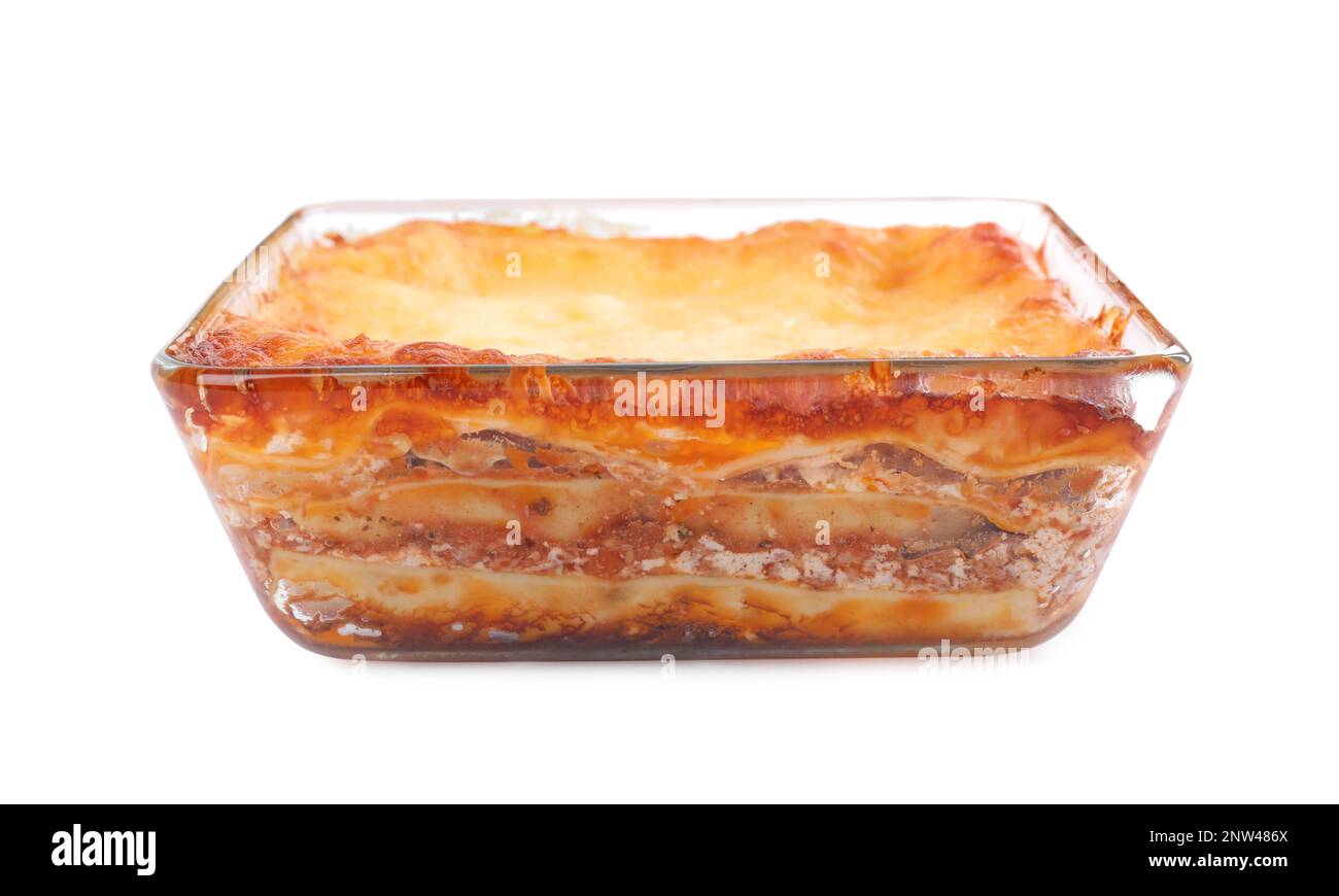 Tasty cooked lasagna in baking dish isolated on white Stock Photo