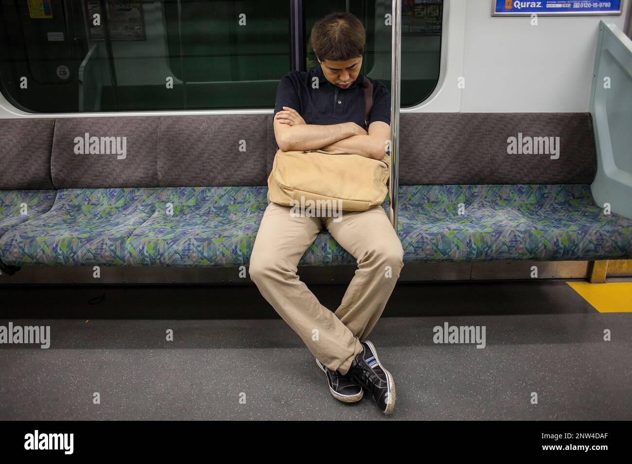 Passenger sleeping in Keio line. Tokyo. Japan Stock Photo Alamy