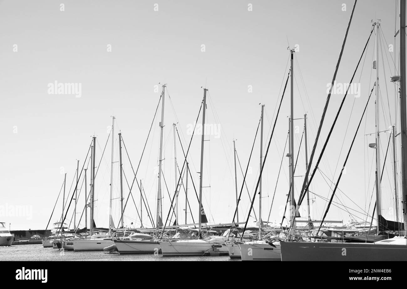 Modern boats near pier. Black and white tone Stock Photo