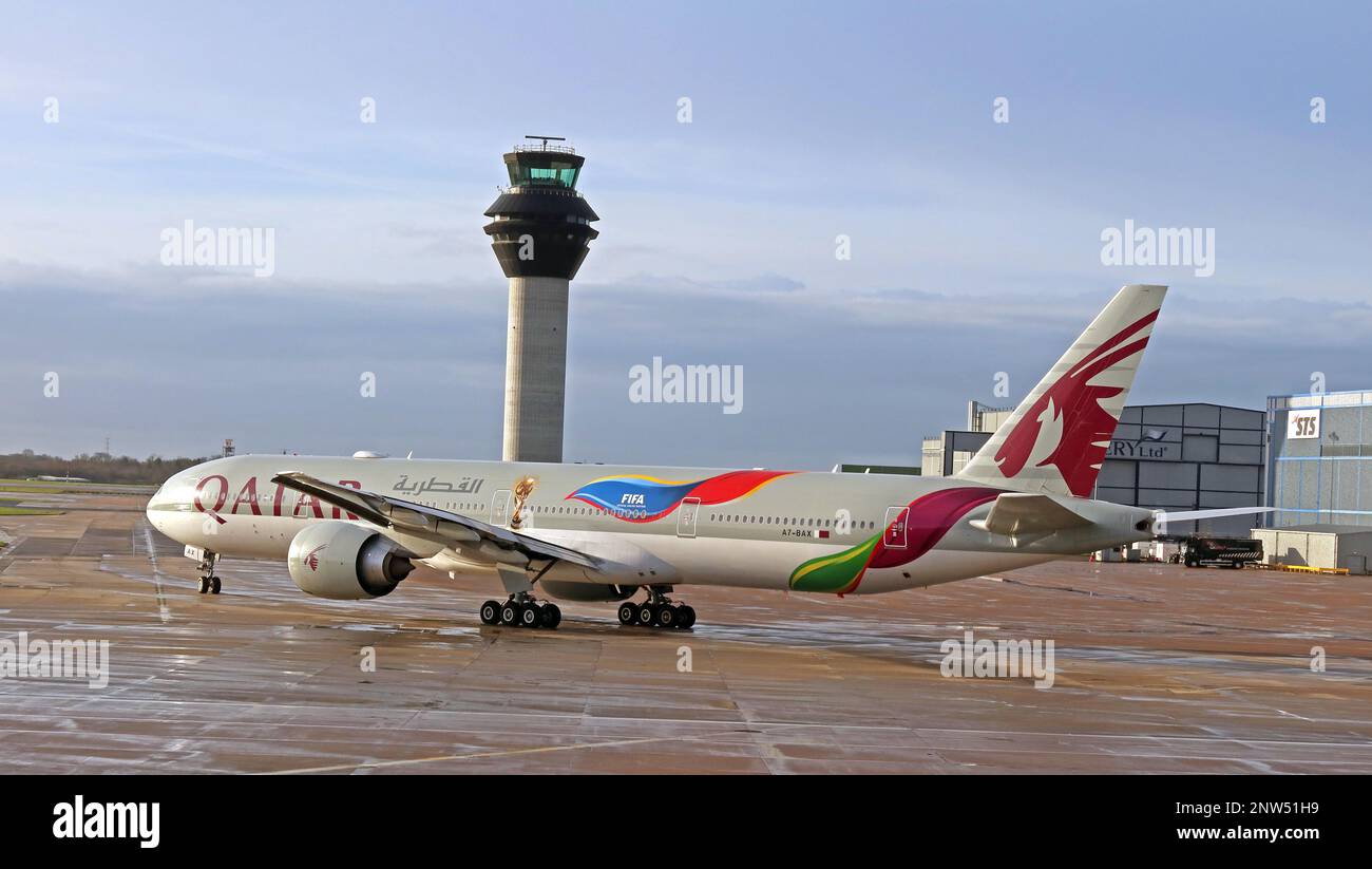Qatar Airways A7-BAX Doha flight, FIFA World Cup 2022 Livery, Boeing 777-3DZ (ER), type B77W, MODE S 06A13A, taxi-ing at Manchester Int' Airport,UK Stock Photo