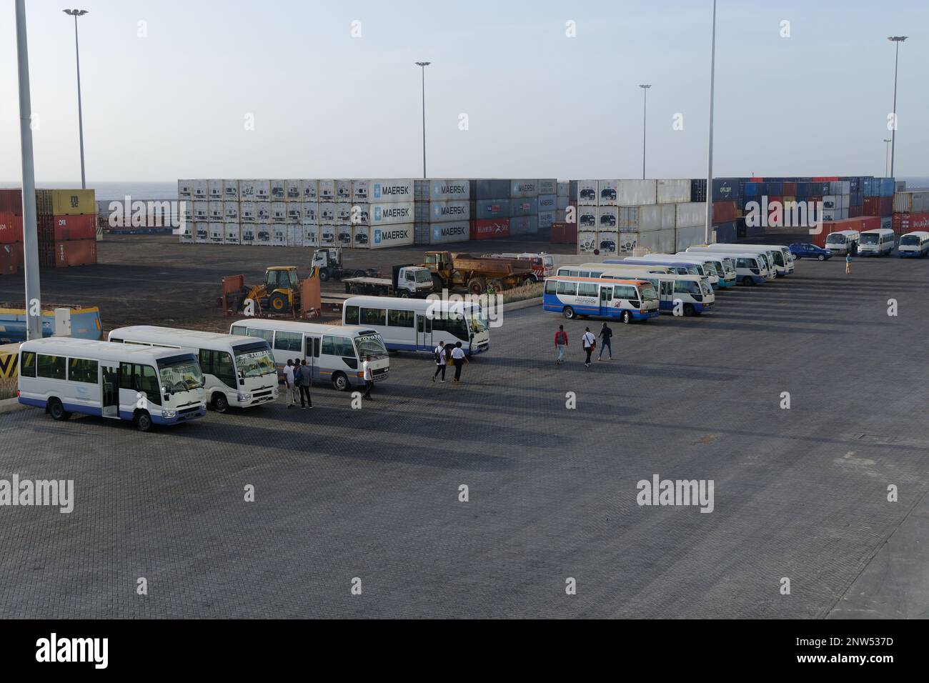 Porto Praia Cape Verde Ilands - A collection of Tour Buses waiting on the quayside to take cruise line passengers on a tour.of the island. Stock Photo