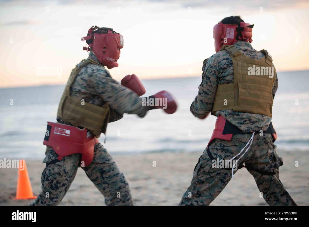 U.S. Marine Corps Cpl. Holden L. Mesimer, left, a Marine Air-Ground ...