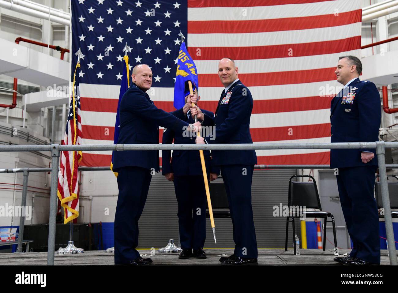 U.S. Air Force Col. Edward W. Cook Jr., the outgoing Commander of the 105th Mission Support Group, relinquishes command facilitated by U.S. Air Force Brig. Gen. Gary R. Charlton II, Commander of the 105th Airlift Wing, during the 105th MSG change of command ceremony at Stewart Air National Guard Base, New York, January 8, 2023. Stock Photo
