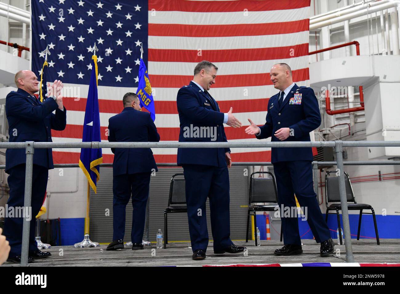 U.S. Air Force Lt. Col. Francis J. Farrelly Jr., Commander of the 105th Mission Support Group, and U.S. Air Force Col. Edward W. Cook Jr., the outgoing commander of the 105th MSG, congratulate each other during the change of command ceremony at Stewart Air National Guard Base, New York, January 8, 2023. Stock Photo