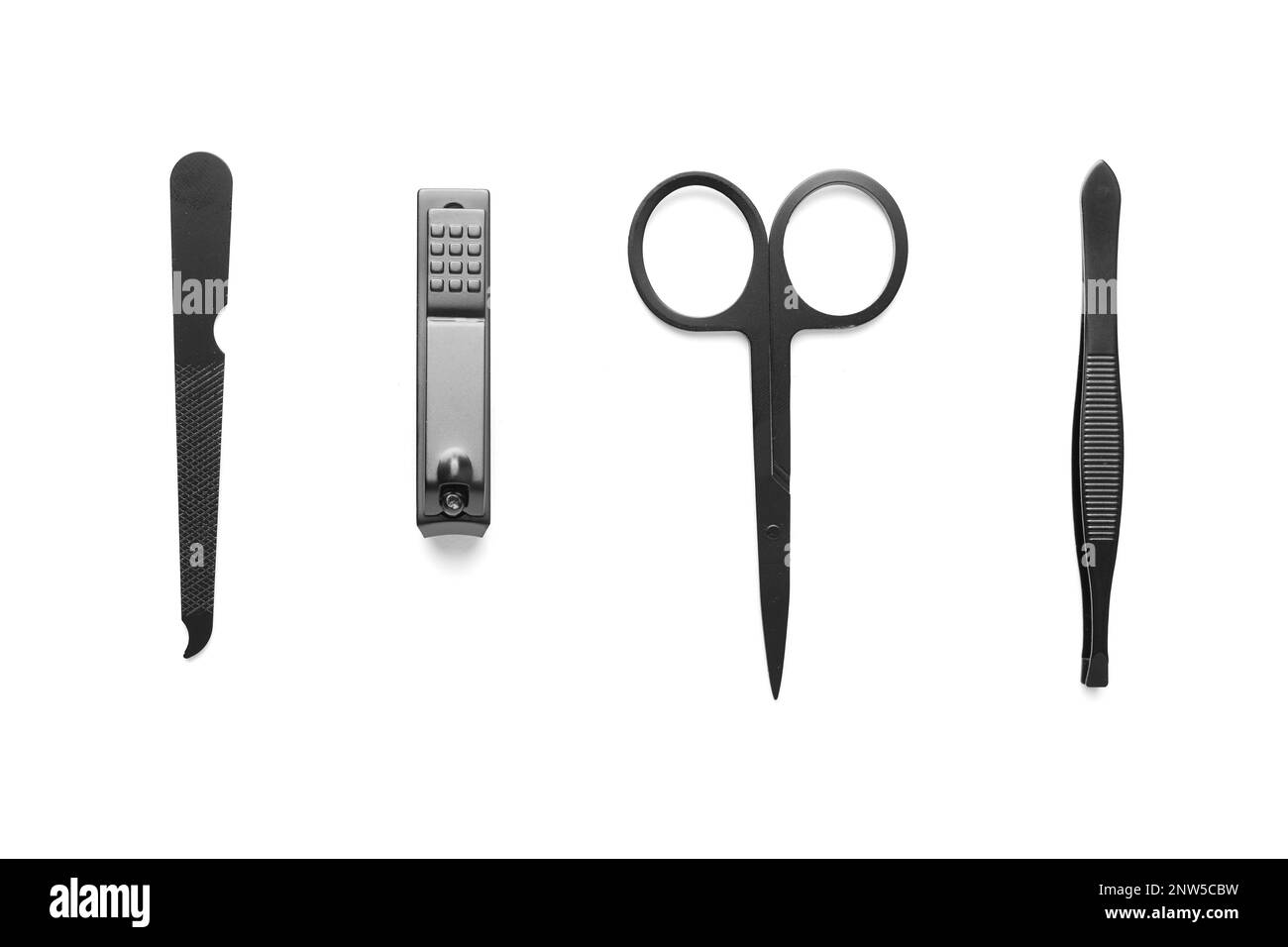 set of steel manicure and pedicure tools isolated on white with copy