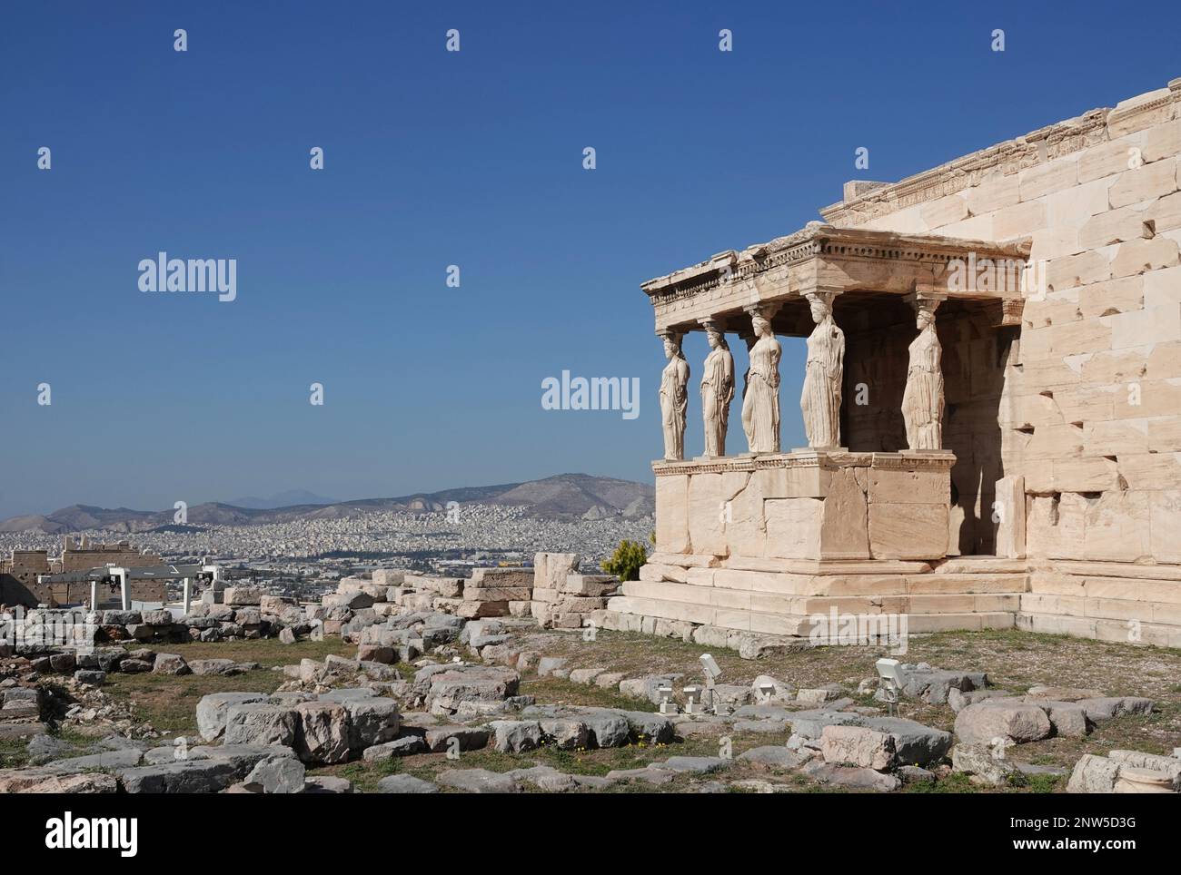 The Erechtheion or Temple of Athena Polias, an ancient Greek Ionic temple-telesterion on the north side of the Acropolis, Athens, which was primarily Stock Photo