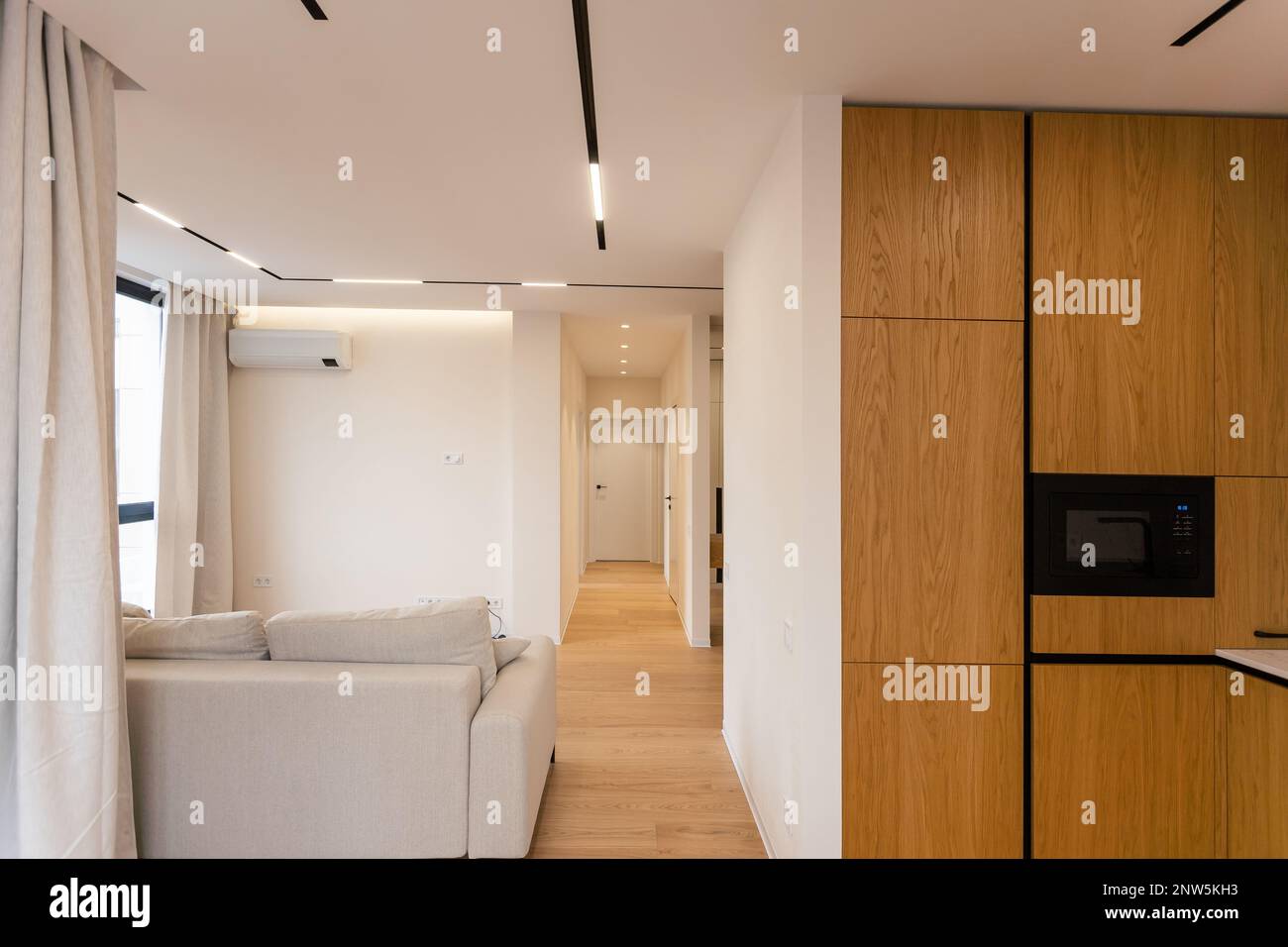 View of Beautiful Modern Kitchen in a Luxury Apartment Stock Photo - Alamy