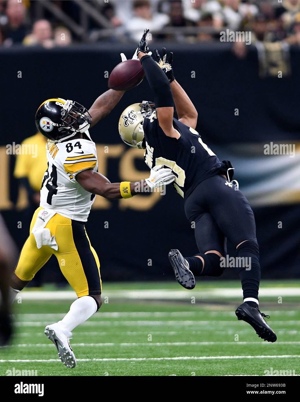 New Orleans Saints cornerback Marshon Lattimore breaks up a pass