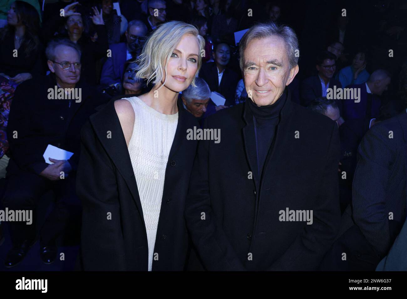 Charlize Theron and Bernard Arnault attends the Dior Womenswear
