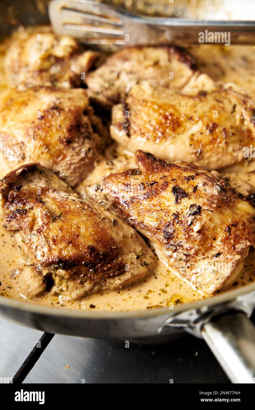 Browned chicken thighs moroccan style. Chicken thighs in creamy gravy