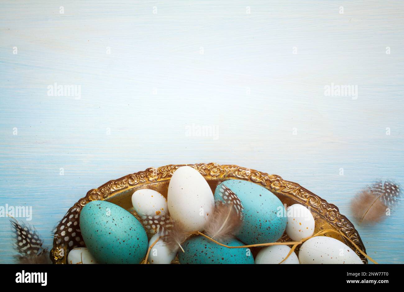 Easter composition on blue wooden background Stock Photo