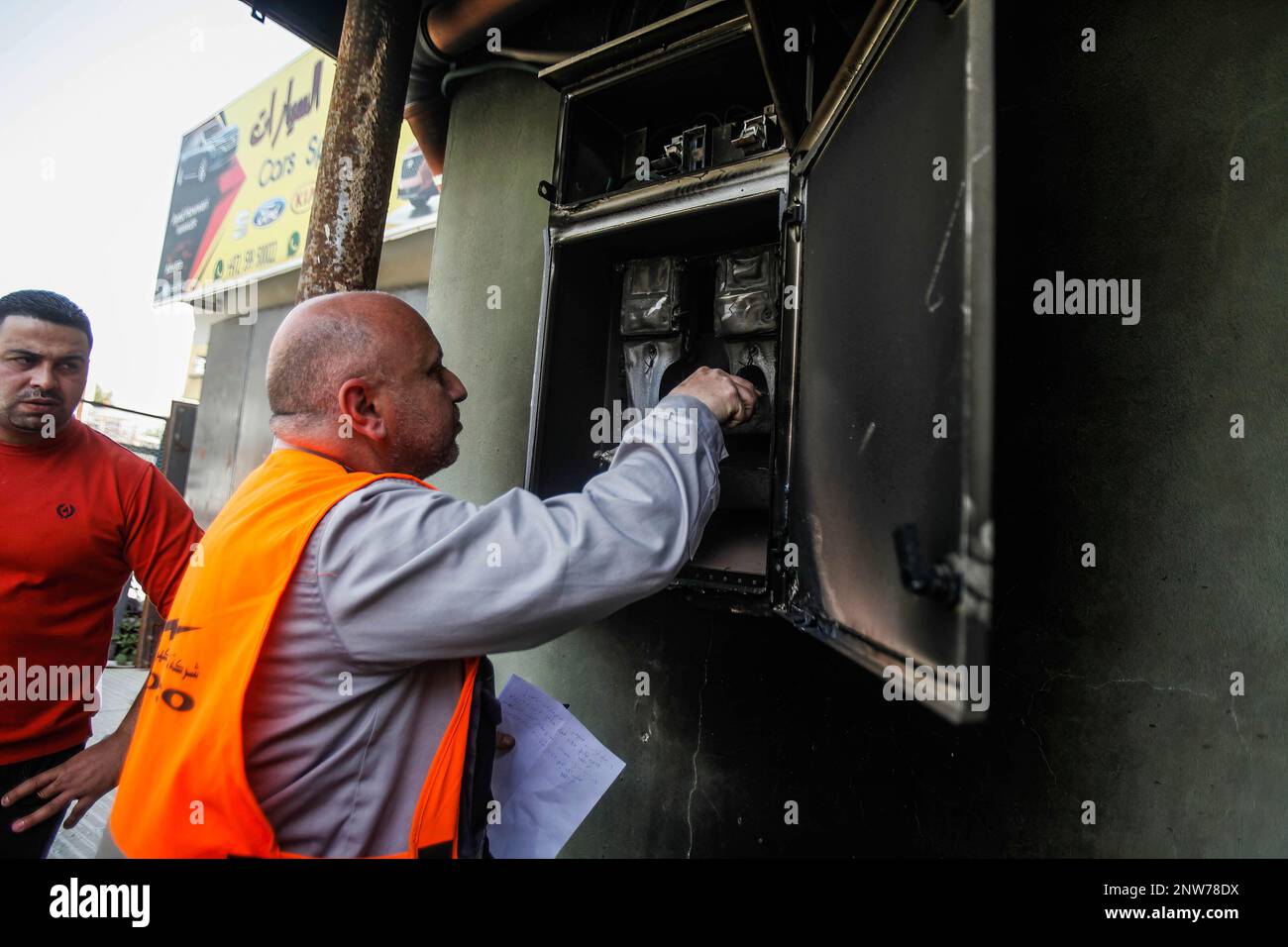 Nablus, Palestine. 28th Feb, 2023. A worker repairs the damages caused