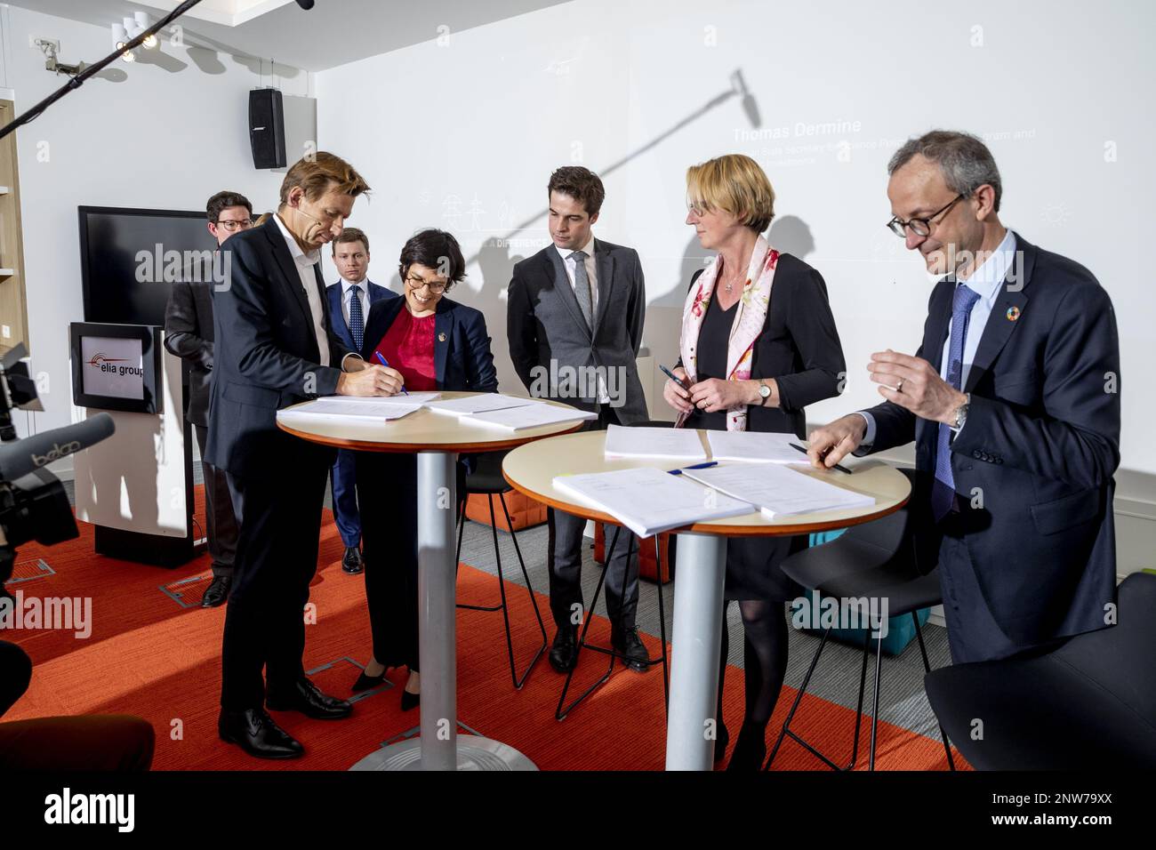 Elia CEO Chris Peeters, Energy minister Tinne Van der Straeten, State Secretary for scientific policy Thomas Dermine and DEME CEO Luc Vandenbulcke pictured during the signing of the EPCI contract for the world's first energy island in the North Sea, the Princess Elisabeth Island, Tuesday 28 February 2023, at the Elia headquarters in Brussels. BELGA PHOTO HATIM KAGHAT Stock Photo