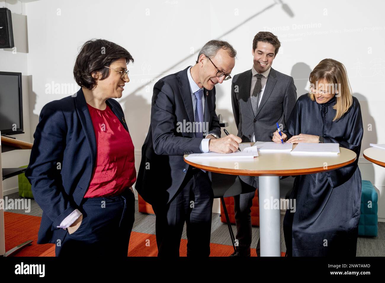 Energy minister Tinne Van der Straeten, DEME CEO Luc Vandenbulcke, State Secretary for scientific policy Thomas Dermine and Julie de Nul pictured during the signing of the EPCI contract for the world's first energy island in the North Sea, the Princess Elisabeth Island, Tuesday 28 February 2023, at the Elia headquarters in Brussels. BELGA PHOTO HATIM KAGHAT Stock Photo