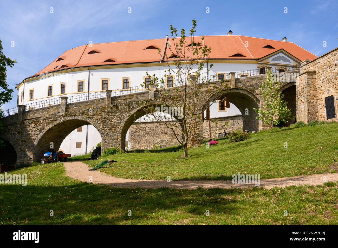Front of the castle in Decin, Czech Republic, with entrance bridge and stone walls Stock Photo