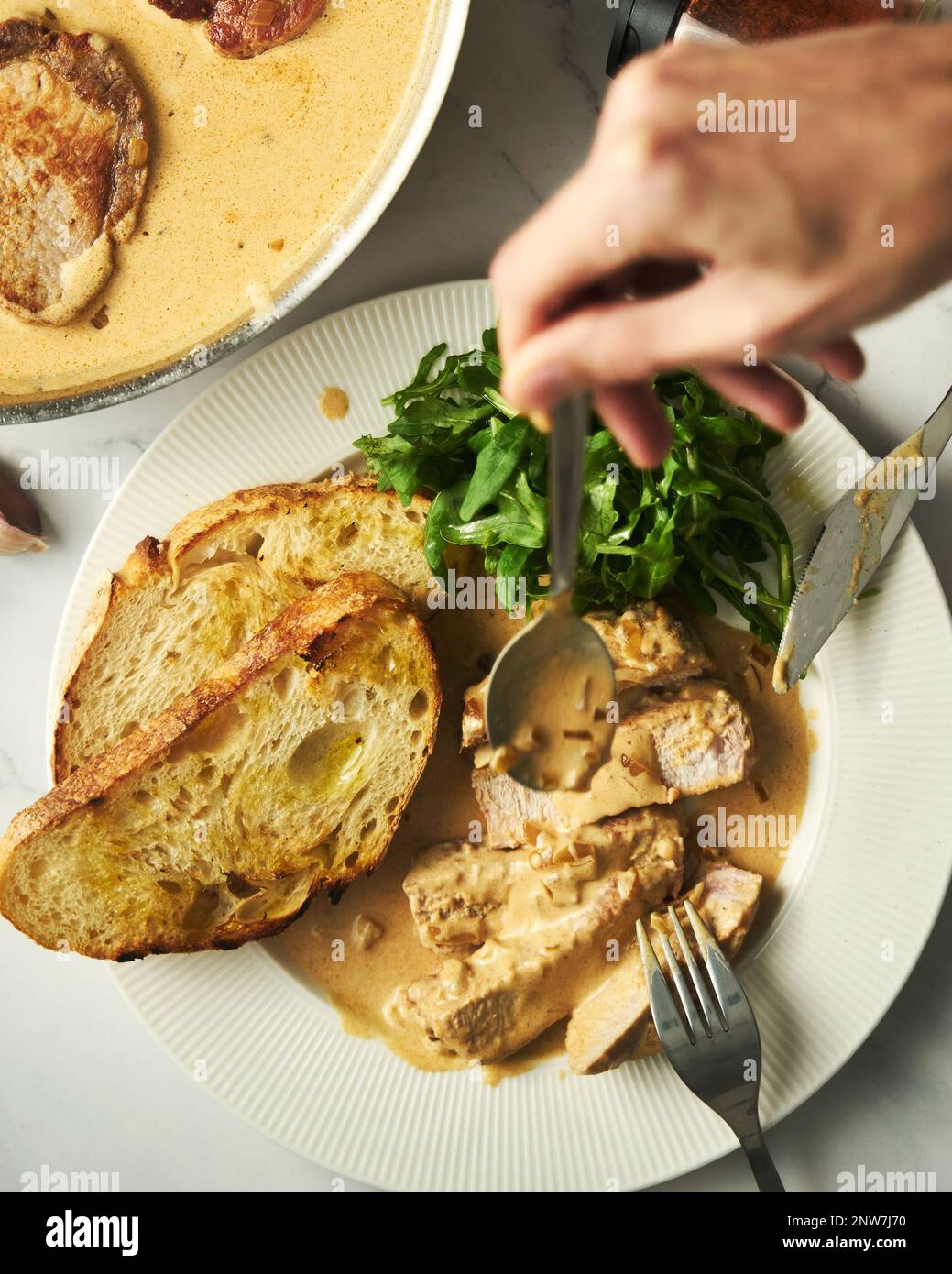 Pork paprikash with onion, butter and garlic. Sauce made from high fat