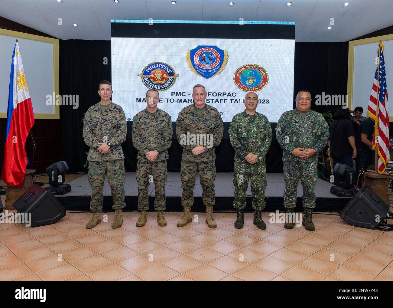 From left to right, U.S. Marine Corps Maj. Gen. Benjamin T. Watson, left, commander, 1st Marine Division, Maj. Gen. Jay M. Bargeron, commander, 3d Marine Division, Lt. Gen. William M. Jurney, commander, U.S. Marine Corps Forces, Pacific (MARFORPAC), Philippine Marine Corps Maj. Gen. Charlton Sean M. Gaerlan, commandant, Philippine Marine Corps (PMC), and Brig. Gen. Jimmy D. Larida, commander, 3rd Marine Brigade, pose for a photograph at the conclusion of the PMC-MARFORPAC Staff Talks, at the Citystate Asturias Hotel in Puerto Princesa, Palawan, Philippines, Feb. 10, 2023. The PMC-MARFORPAC Sta Stock Photo